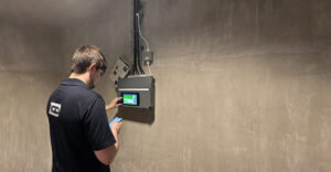 An IGD engineer performs gas detection maintenance on an IGD system.